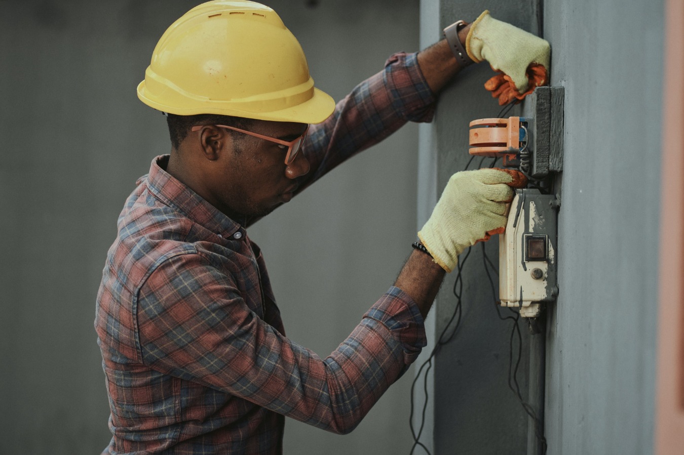 Man in hard hat working.