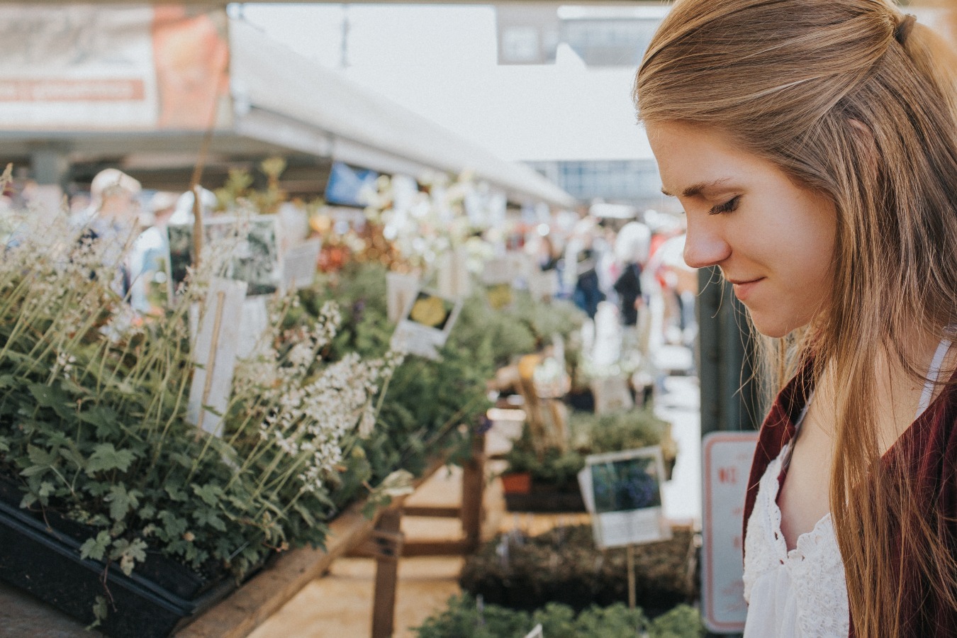 Woman at a farmers' market.